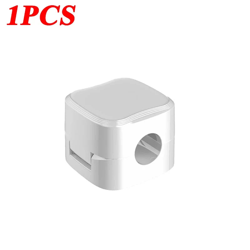 ChatGPT powiedział: Magnetyczny uchwyt na kable - organizer z samoprzylepną podstawą do uporządkowania przewodów w domu i biurze, idealny do montażu pod biurkiem.